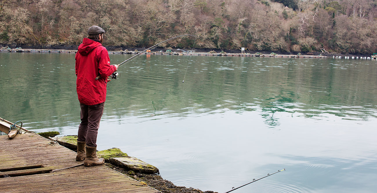 Image of Thom fishing