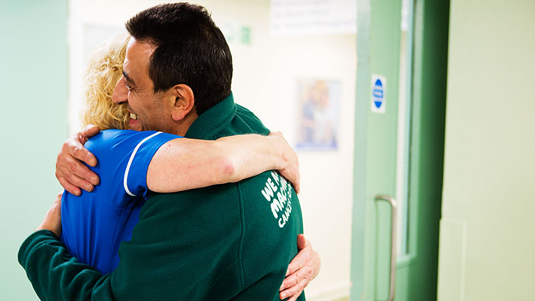 Mario hugs his Macmillan nurse