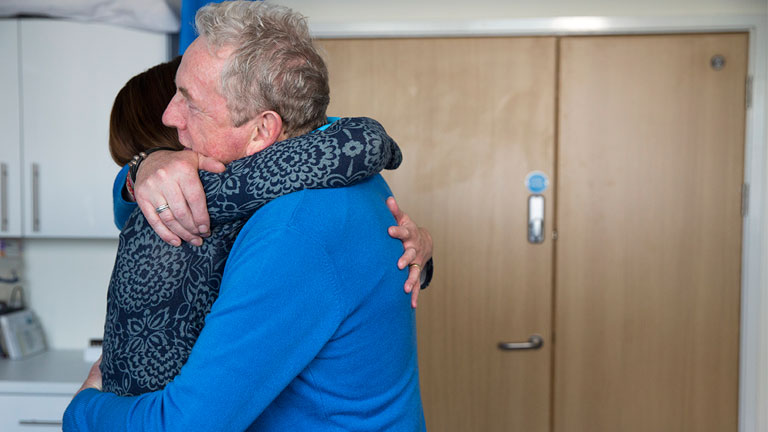 Dave hugs his Macmillan professional.