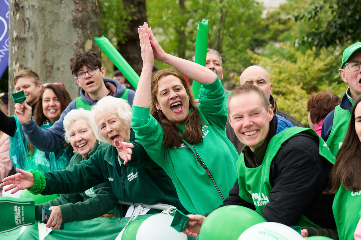 A crowd cheering for runners at the London marathon
