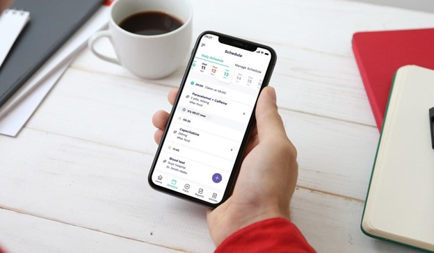 A mobile phone showing a health schedule app.