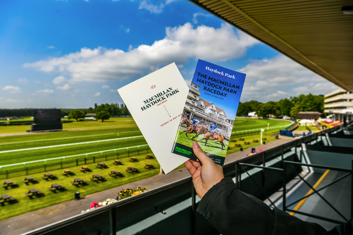 A photograph of the Macmillan Haydock Park Raceday leaflets from 2023.
