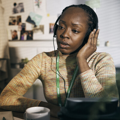 A Macmcillan support line worker on a call