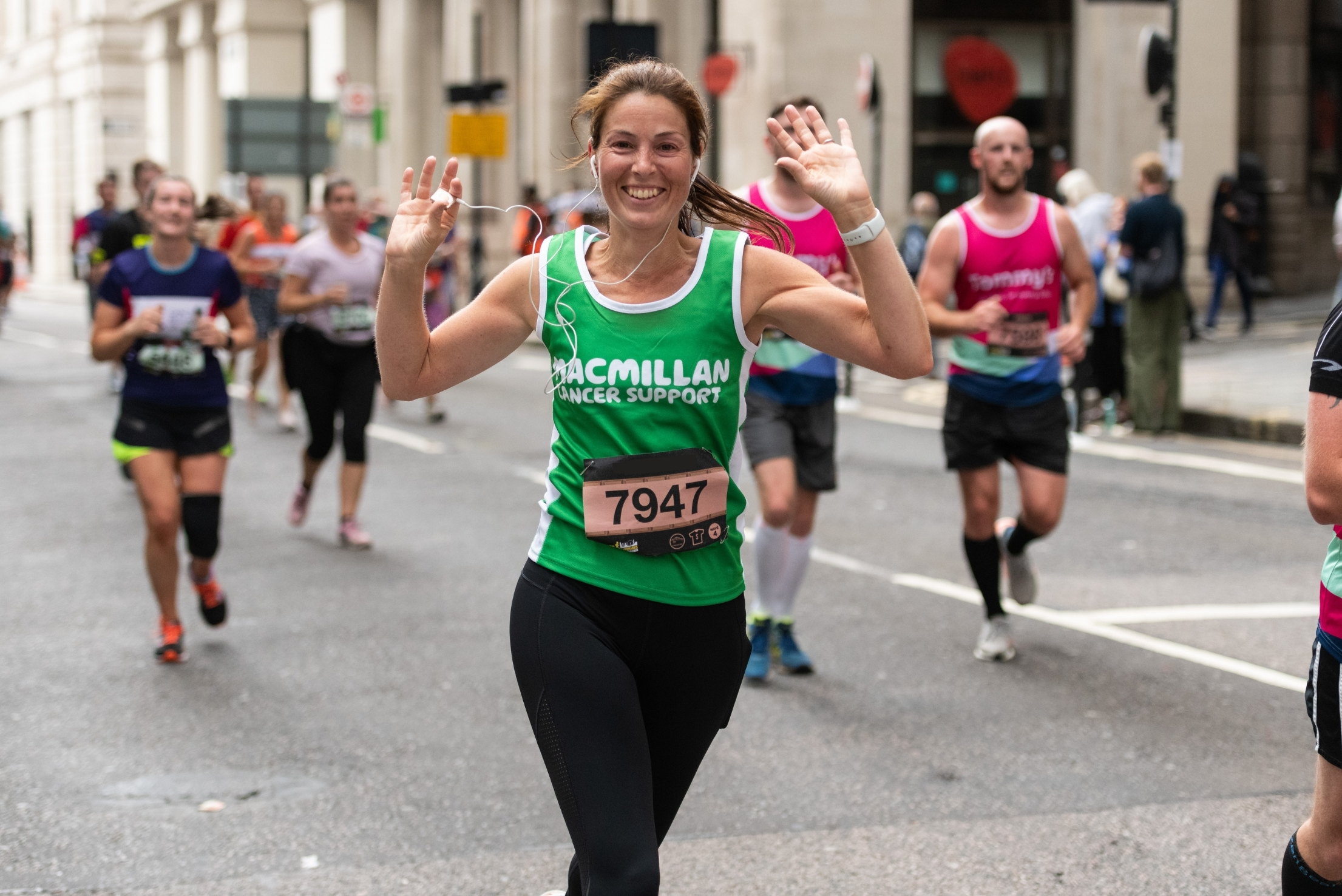 Woman running at London Landmarks for Macmillan