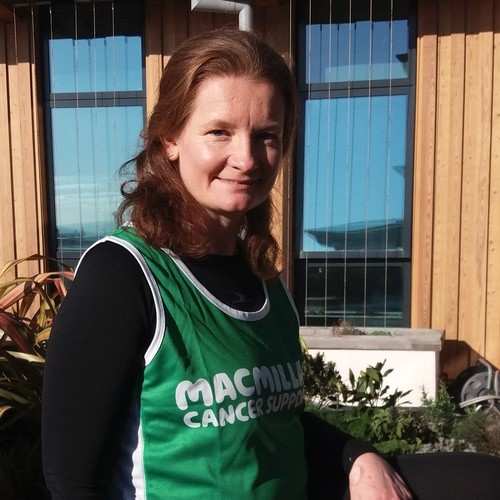 Louise wearing a Macmillan running vest