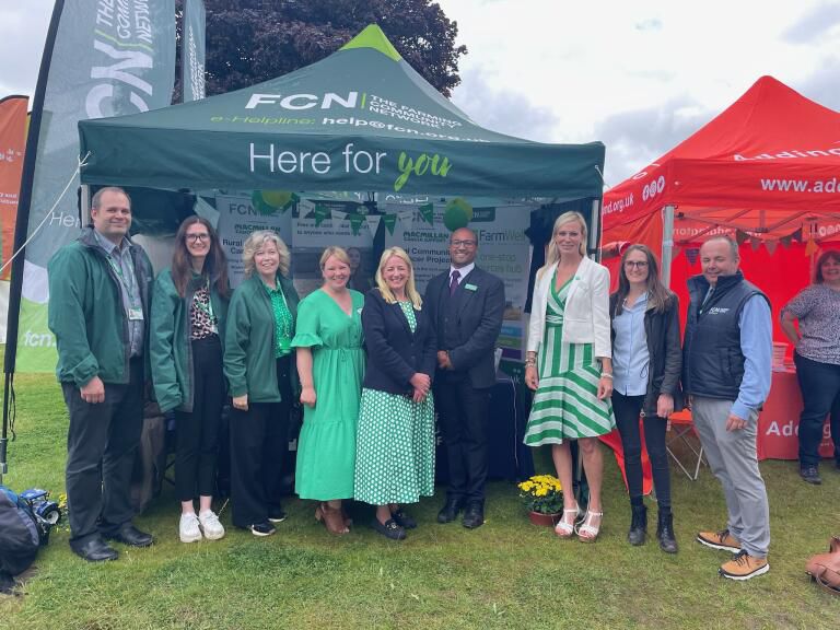 A small group of people from Macmillan Cancer Support and the Farming Community.