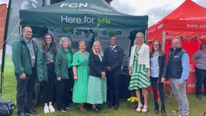 A small group of people from Macmillan Cancer Support and the Farming Community.