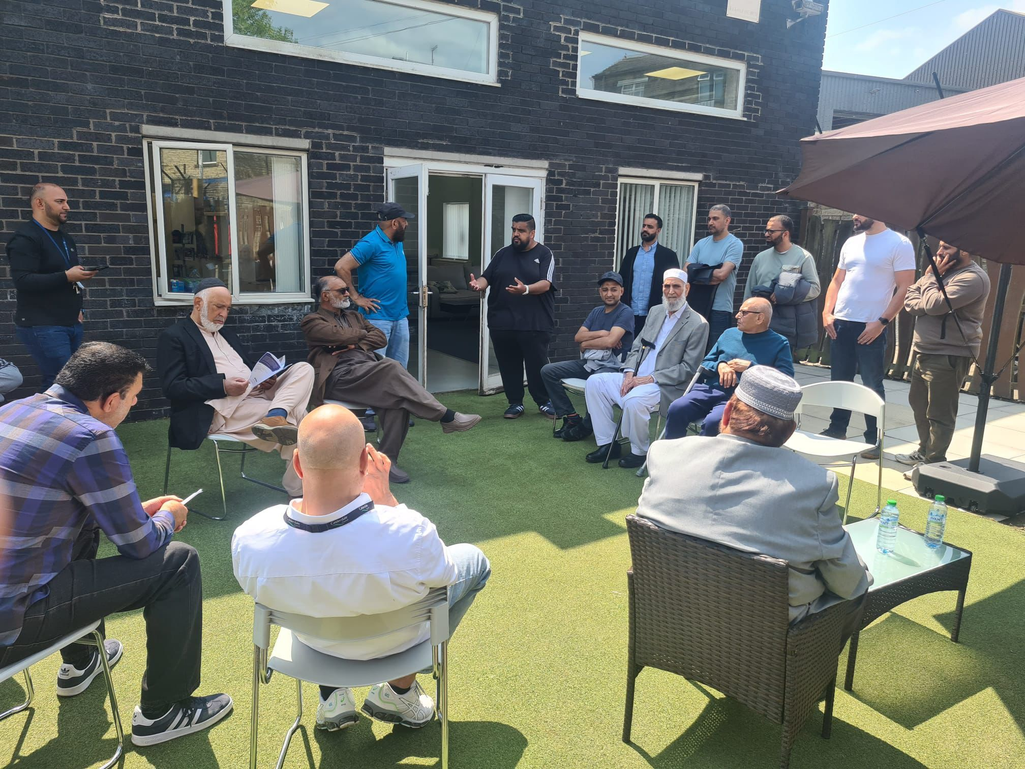 A group of people talking part of Calderdale Cancer Champions.