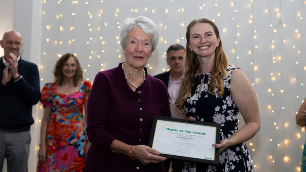 Helen Kernahan from the Bereavement Call Volunteer Team, runner up in the 2025 Thanks to you award - with Strength with event host Erin Kennedy OBE on the right