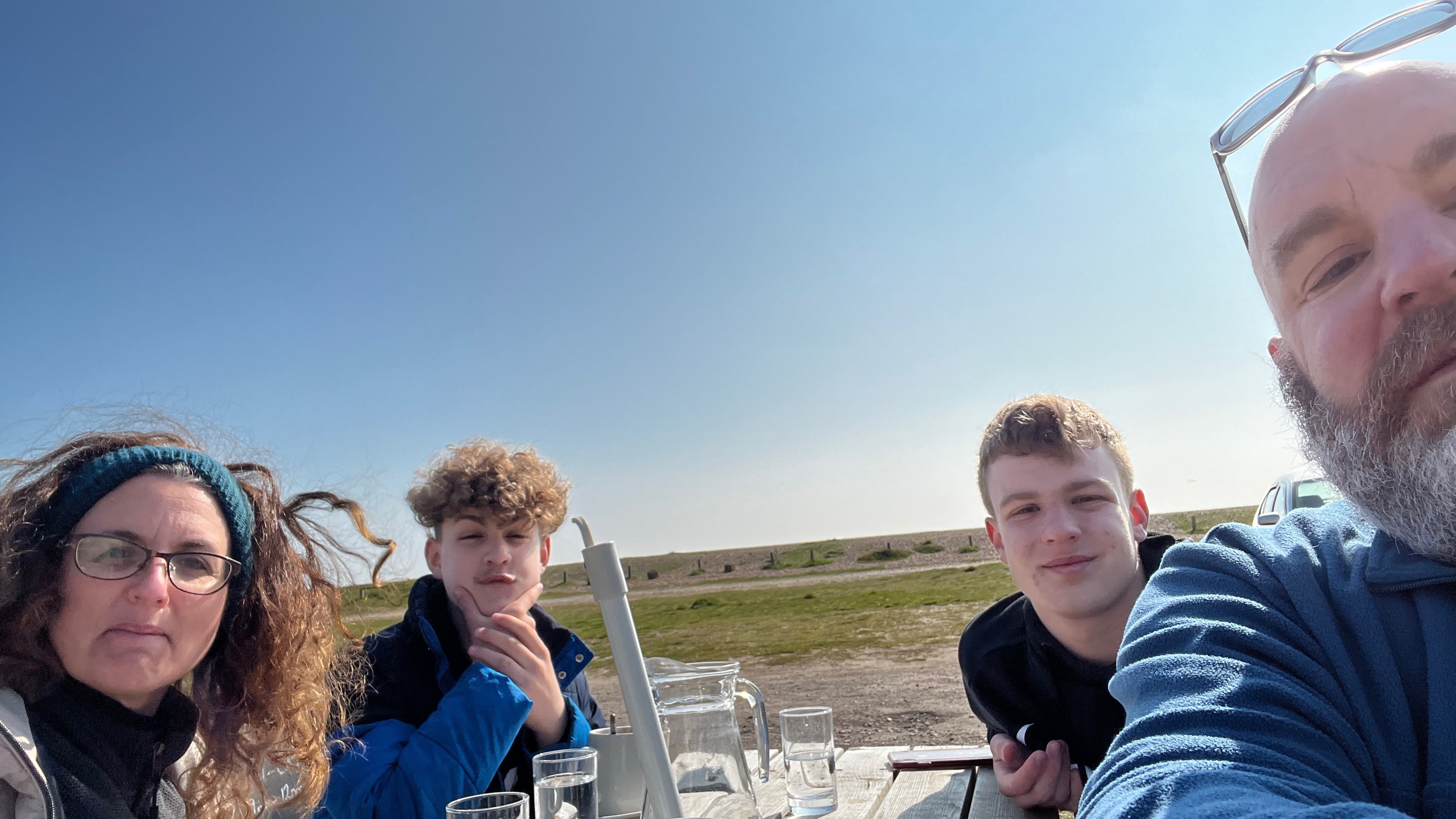 Jon with his wife and 2 teenage sons.