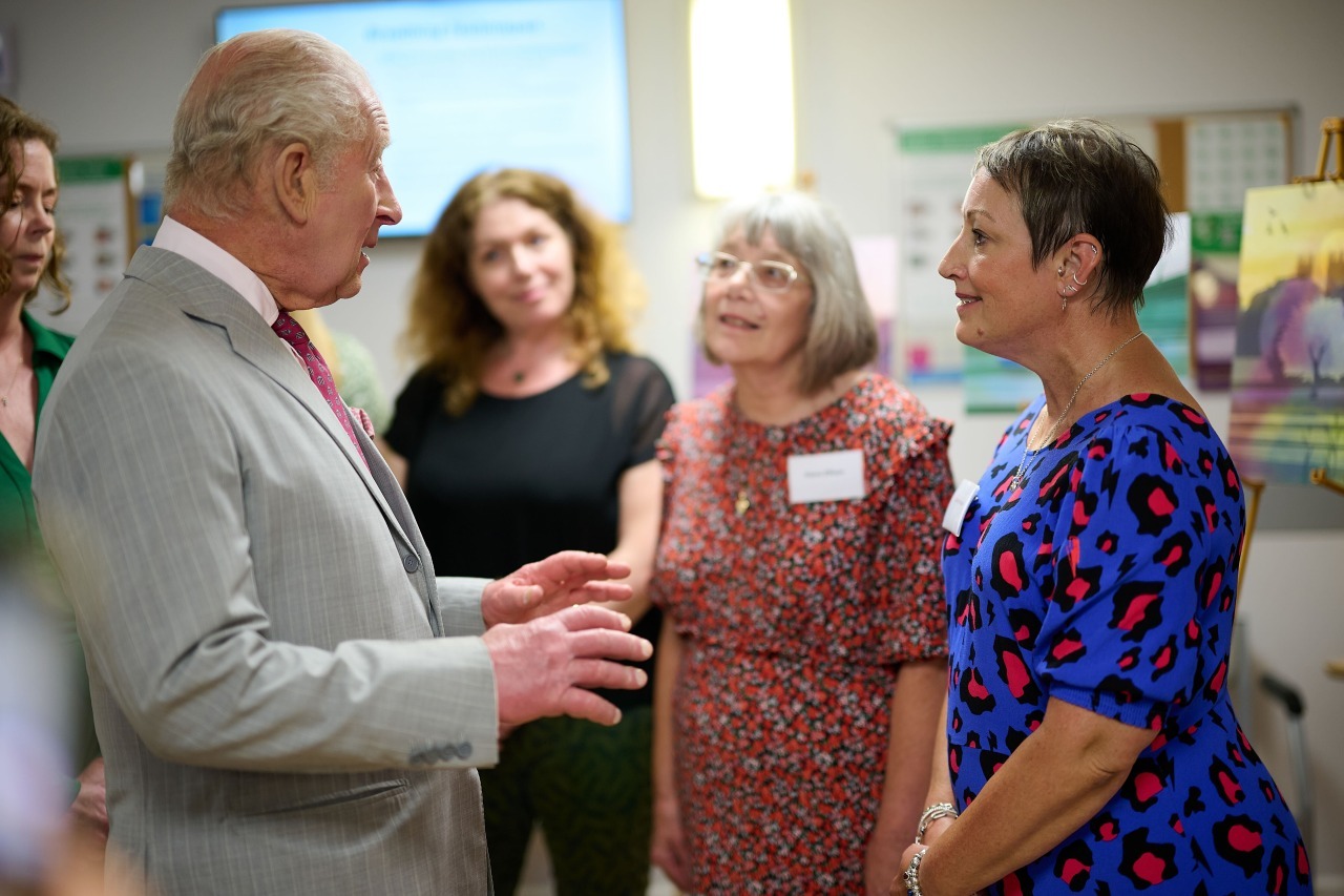 His Majesty meeting Community Engagement Volunteer Louise Rhodes