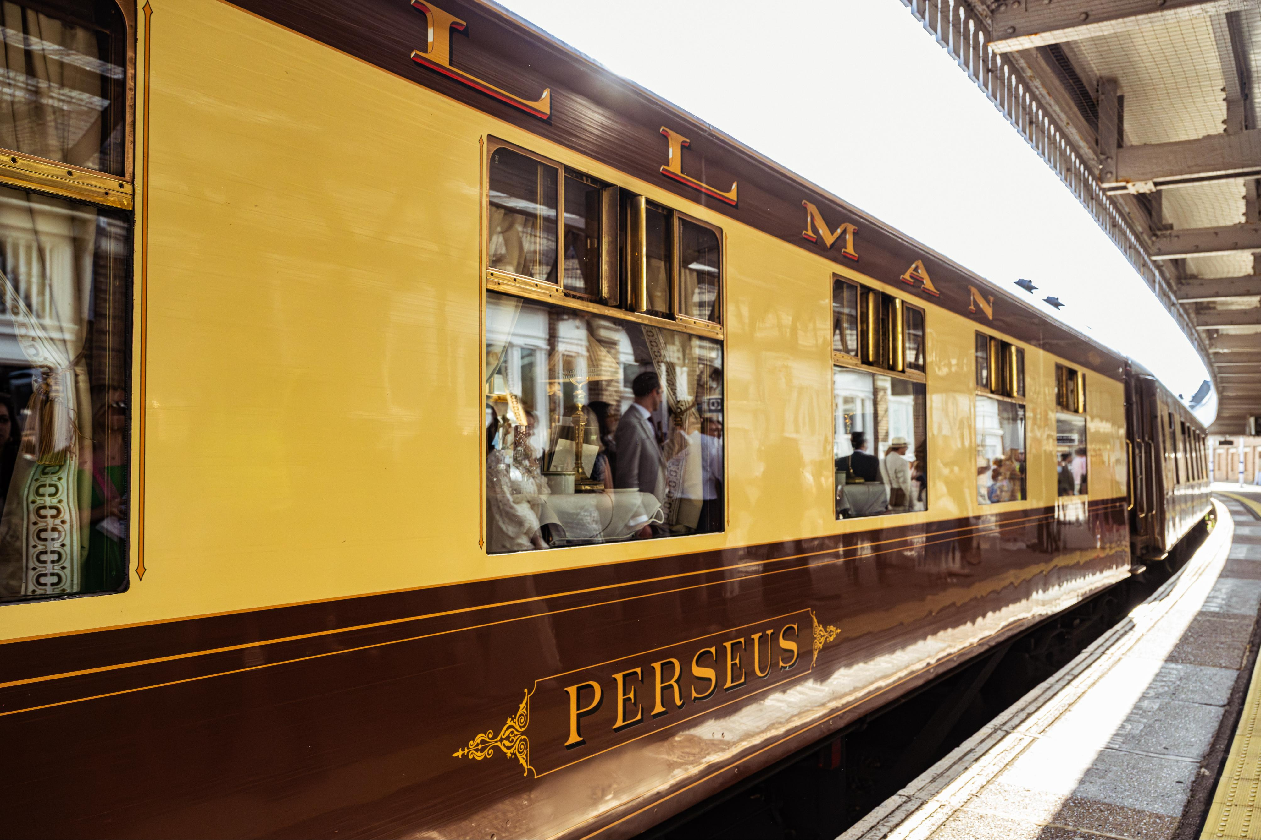 A British Pullman train carriage at a train station