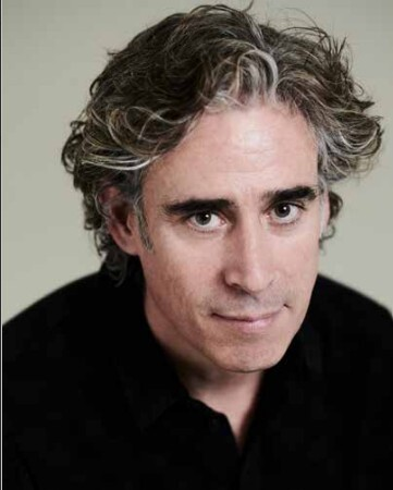 Professional headshot of Stephen Mangan