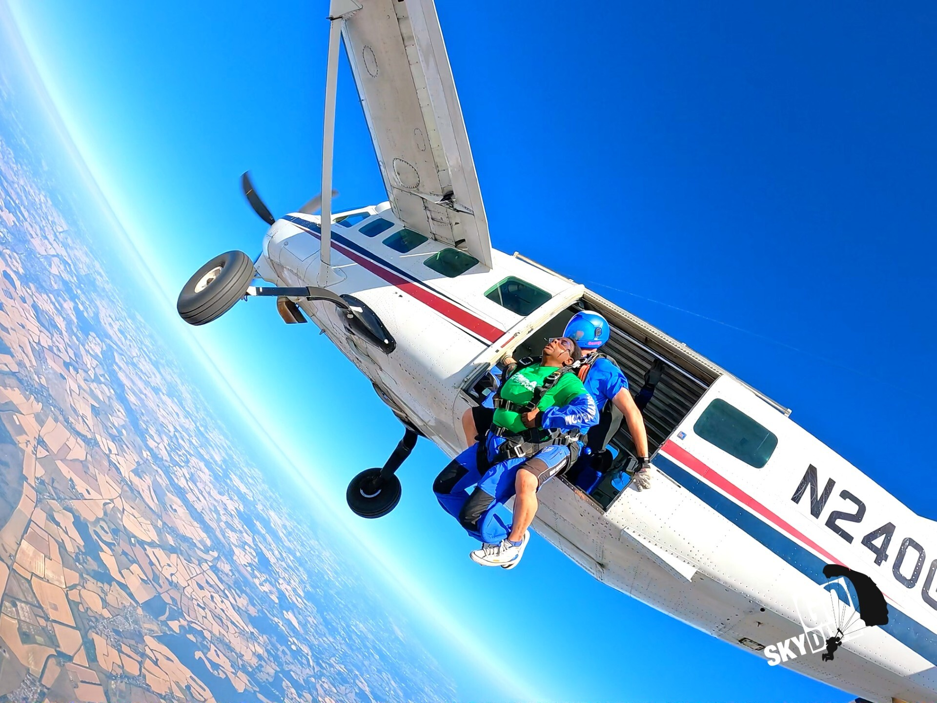 Blessing just at the point of jumping out of the plane.
