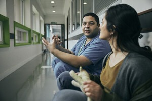 Male nurse and woman